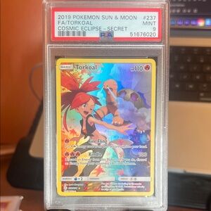 Pokemon Torkoal Card - Vibrant Blue and Red Design